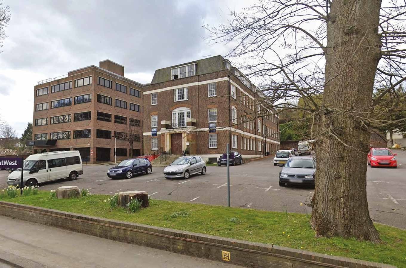 The existing vacant office buildings and car park at 149-153 Preston Road